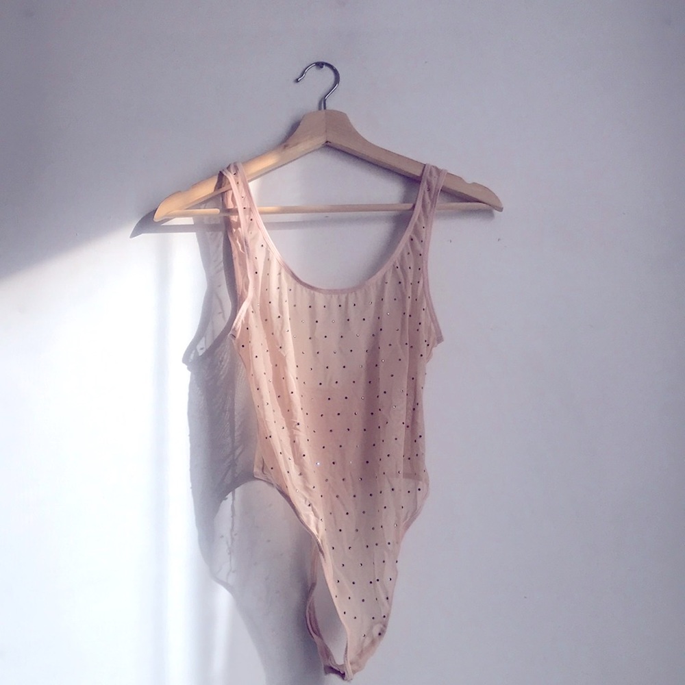 Forever 21 mesh bodysuit size small. Pinky nude with rhinestones. Thong back.